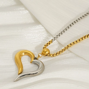 Modern two-tone stainless steel heart pendant necklace with gold and silver box chain