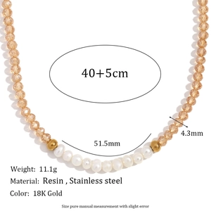 Beaded necklace with freshwater pearls and amber crystals on 18K gold stainless steel chain