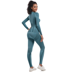 Close-up of teal seamless knit fabric with breathable back mesh and compression texture