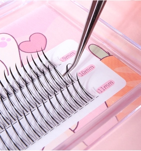 Macro view of individual fishtail false eyelashes in 9mm, 10mm, and 11mm lengths