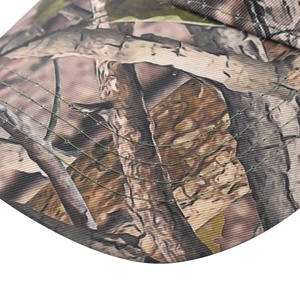 Macro shot of durable leaf camouflage fabric with six parallel stitches on the cap brim