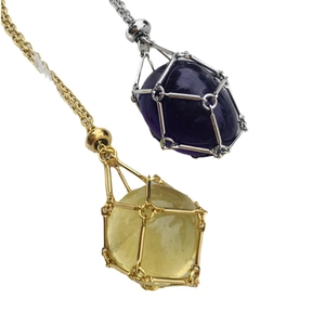 Natural crystal cage necklaces in silver and gold metal with polished gemstone pendants