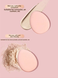 Detailed view of pink finger puff for dual wet and dry application of foundation and powder