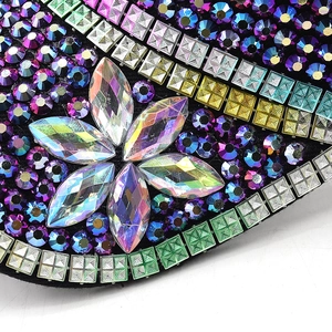 Close-up of sparkling colorful rhinestones and crystal details on a fashion sun hat