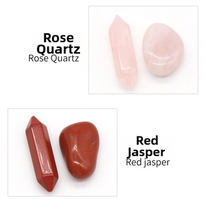 Detail view of natural Rose Quartz and Red Jasper hex pillars with raw stone specimens