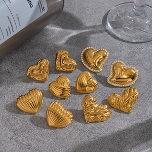 Elegant gold heart earrings set featuring textured designs and rhinestone accents