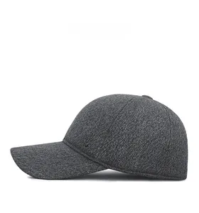 Side view detail of a dark gray textured wool baseball cap with an embroidered F logo