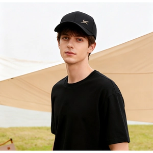 Detail of classic black baseball cap with side embroidery for outdoor sun protection