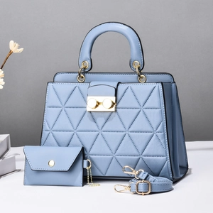 Fashionable light blue quilted leather handbag set with matching pouch and gold hardware