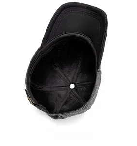 Internal structure of baseball cap showing breathable mesh and metal adjustable buckle