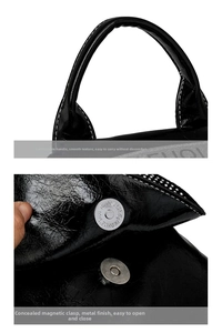 Macro detail of black wrinkled leather handle and magnetic snap closure of the backpack