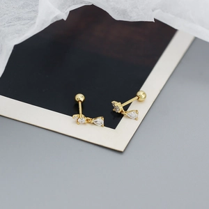 Detailed close-up of S925 silver gold teardrop tassel stud earring with zircon