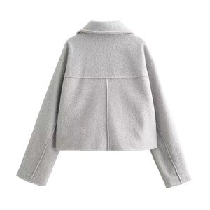 Detailed back view of a grey short wool coat with lapel collar and dropped shoulder seams