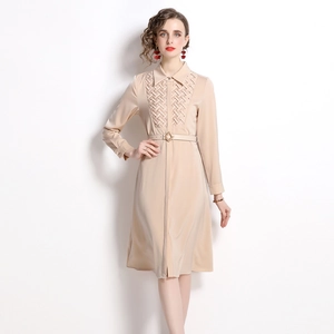 Elegant apricot long-sleeved shirt dress with belted waist and woven front details