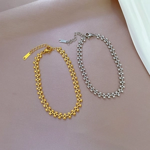 Bracelet à maillons X en acier inoxydable fini doré et argenté minimaliste