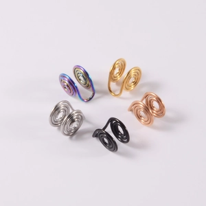 Detailed view of non-pierced clip-on earrings in five different metallic plating finishes