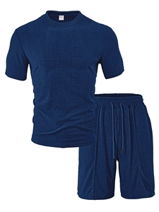 Detail of dark blue polo set showing the 3D waffle texture and polyester spandex fabric