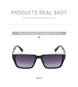 Front view of square black sunglasses with gold metal trim and gradient gray lenses
