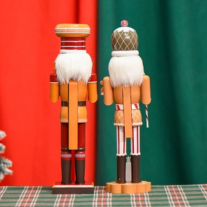 Rear view of 38cm wooden gingerbread chef nutcrackers with lever details for Christmas