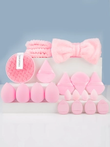 Macro view of 20pcs pink makeup sponge set with headbands and powder puffs for travel