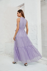 Detail of lavender purple halter neck dress featuring layered mesh and checkered texture