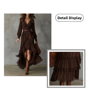 Detail of bohemian wrap dress with layered ruffles and irregular hem in dark brown
