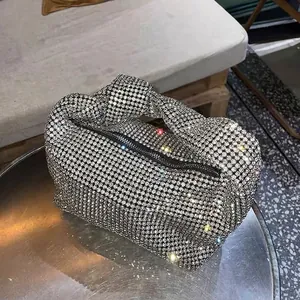 Sparkling silver rhinestone hobo bag with knotted handle for elegant evening parties