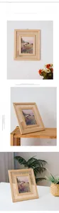 Solid wood photo frame with rattan weave detail and oil painting displayed on wall