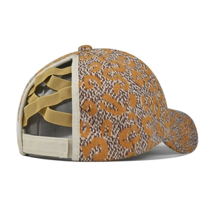 Detail of leopard print ponytail baseball cap showing criss-cross elastic and velcro strap