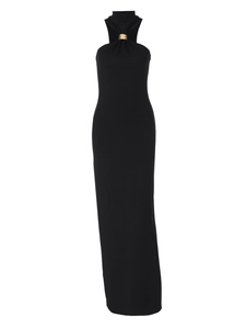 Detail of high neck black slim fit dress featuring a gold metal ring on the neckline