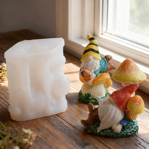 Detail of translucent silicone gnome mold with finished colorful resin garden ornaments