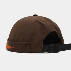 Detail of adjustable strap and Music Club embroidery on quick-dry docker hat