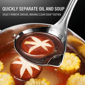 304 stainless steel oil separator ladle filtering fat from a fresh mushroom soup