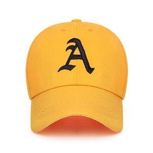 Yellow cotton baseball cap with black gothic A embroidery and trendy streetwear style