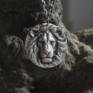 Rugged lion head relief pendant necklace in silver finish on dark stone background