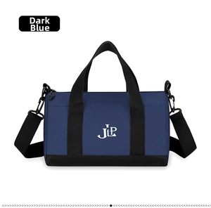Detail of dark blue waterproof nylon travel bag with JLP logo and detachable strap