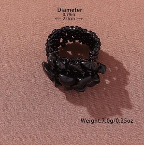 Detail view of handmade black beaded ring with 0.79 inch diameter and 7.0g weight specs