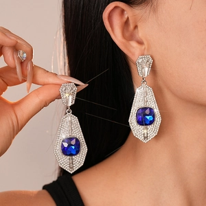 Vintage luxury geometric earrings featuring large square blue crystal and white rhinestones