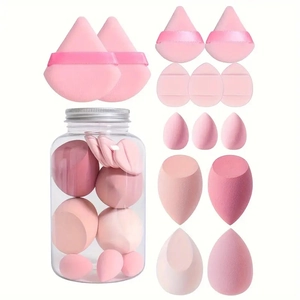 Pink 14-piece makeup sponge set with assorted shapes in a clear storage jar