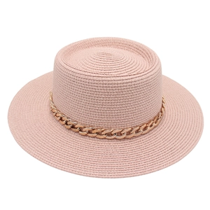 Pink French dome straw hat with decorative gold chain link band for summer sun protection