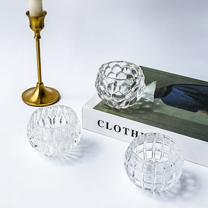 Three-piece pumpkin shaped glass candle holders with vintage textured patterns for home decor