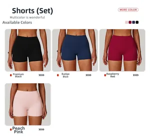 Macro view of high-waisted yoga shorts in black, dark blue, raspberry red, and peach pink