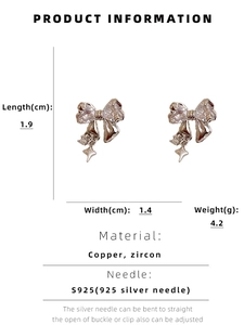 Detailed view of silver bow earrings with zircon star charms and S925 silver needles
