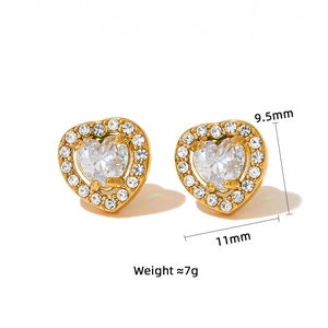Macro shot of heart-shaped crystal earrings with size specs 9.5mm by 11mm