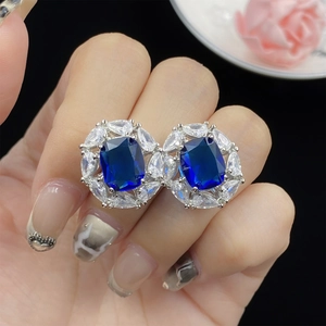 Elegant London blue topaz earring set with sapphire-cut stones and zircon floral clusters