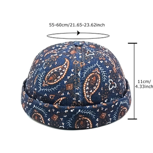 Navy blue denim paisley miki hat with retro cashew flower print and brimless dock cap design
