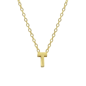 Macro shot of 925 sterling silver golden T-letter pendant on a minimalist chain