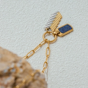 18K gold-plated titanium steel necklace with blue lapis lazuli and wing pendant