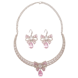 Elegant silver jewelry set with pink crystal bow necklace and matching drop earrings
