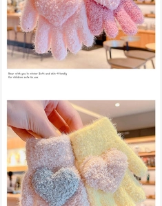 Close-up of soft plush heart gloves for kids in pink, beige, and yellow colors